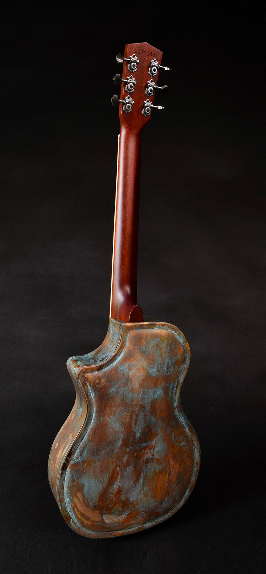 JR-994, corps en laiton"Brass Rust", manche acajou, touche palissandre, micro simple, résonateur single cone, soft case
