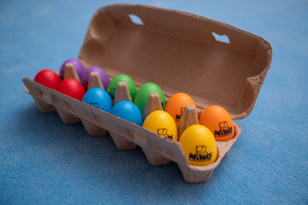 12 oeufs shaker son doux NINO couleurs + boîte de rangement/présentation